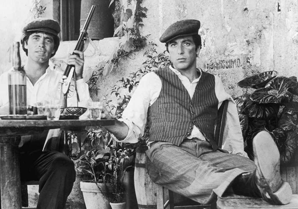 Al Pacino and Franco Citti in The Godfather