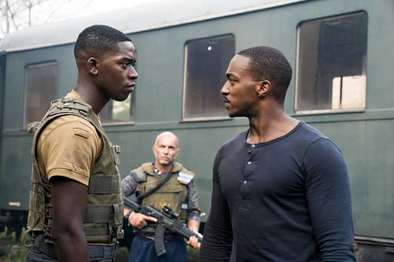 OUTSIDE THE WIRE, Damson Idris as Harp, ​Anthony Mackie ​as ​Leo, in OUTSIDE THE WIRE. Cr. ​Jonathan Prime​/NETFLIX ​© ​2020
