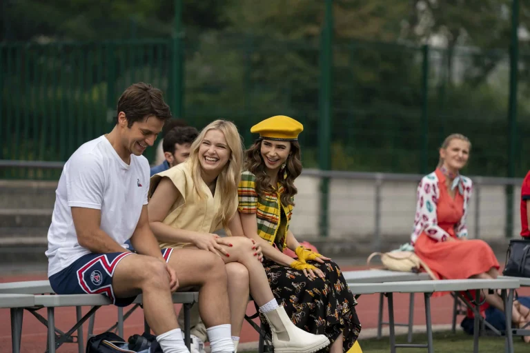 Emily in Paris 2 (L to R) Lucas Bravo as Gabriel, Camille Razat as Camille, Lily Collins as Emily in episode 209 of Emily in Pari