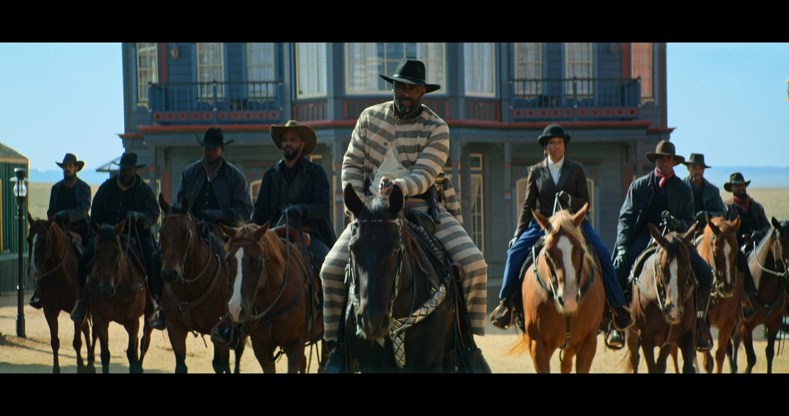 THE HARDER THEY FALL (L to R) (4th from Left) DELROY LINDO as BASS REEVES, IDRIS ELBA as RUFUS BUCK, and REGINA KING as TRUDY S