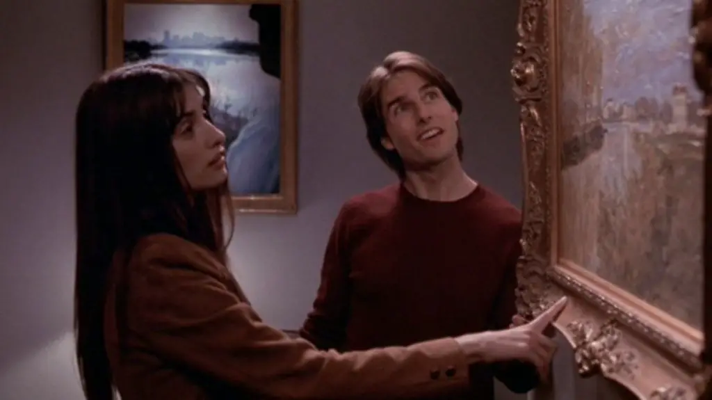 Sofia (Penélope Cruz) e David (Tom Cruise) davanti al quadro di Monet