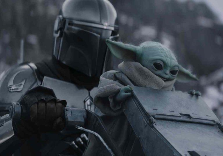 (L-R) The Mandalorian and Grogu in Lucasfilm's THE MANDALORIAN AND GROGU. Photo courtesy of Lucasfilm. © 2026 Lucasfilm Ltd™. All Rights Reserved.